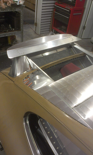 Engine deck and rear spoiler work.